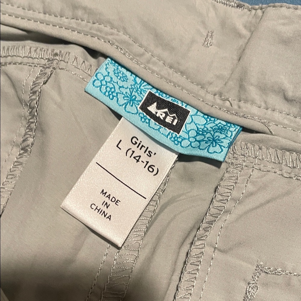 REI Girls Light Gray Outdoor Convertible Pants with Blue Floral Tag - Picture 2 of 5